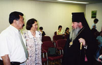The Kalmyk minister of culture N. Sanjiev, IBT translator V. Shugraeva, Archbishop Zosima.